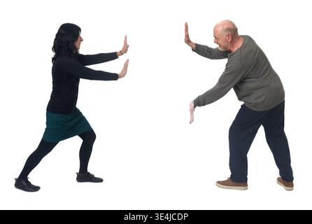 couple pressing something imaginary against each other Stock Photo