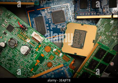 Close-up of computer hardware components including CPU and circuit boards, illustrating modern technology and electronics engineering Stock Photo