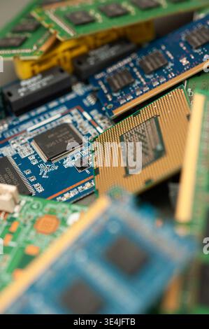 Close-up of computer hardware components including CPU and circuit boards, illustrating modern technology and electronics engineering Stock Photo