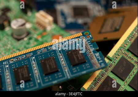 Close-up of computer hardware components including CPU and circuit boards, illustrating modern technology and electronics engineering Stock Photo