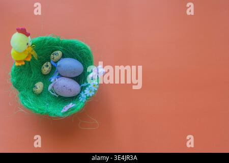 Image for Easter banners or cards on a red background. Place for text. Stock Photo