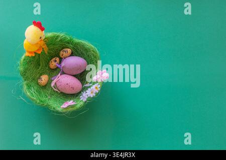 Image for Easter banners or cards on a green background. Place for text. Stock Photo