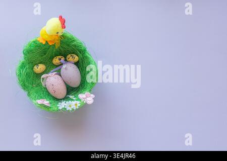 Image for Easter banners or cards on a purple background. Place for text. Stock Photo
