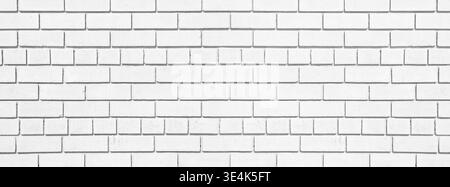 White brick long texture. Lime washed brickwork wide background. Light painted block wall abstract backdrop Stock Photo