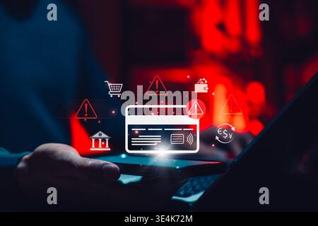 Payment Fraud Alert and Card Security Risk Concept. Person holding smartphone with credit card, warning icons, banking, shopping, wallet, Stock Photo