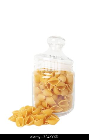 Conchiglie rigate. Raw striped shell pasta in jar isolated on white background. Top view Stock Photo