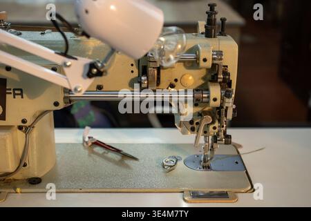 Detailed Close-Up of a Vintage Sewing Machine Highlighting Its Intricate Mechanisms and Tools for Tailoring Projects Stock Photo