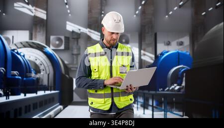 Engineer Oversees Gas Turbine Operations At Power Plant Control Room Stock Photo