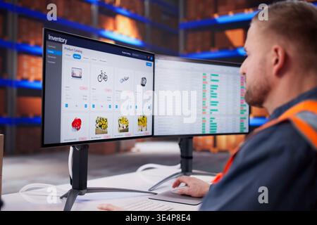 Warehouse Staff Using Barcode Scanner To Update Parcel Inventory In Logistics Facility Stock Photo