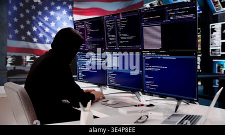 Cybersecurity Expert Coding Against The Backdrop Of The American Flag Stock Photo