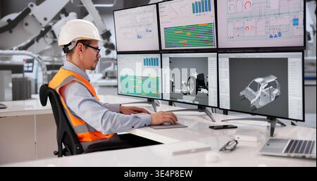 Automotive Engineer Developing Precision Car Components With CAD Software On Desktop Computer Stock Photo