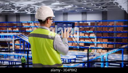 Warehouse Supervisor Reviews Inventory Metrics On Digital Tablet In Logistics Center Stock Photo