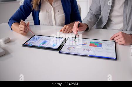 Business Professional Analyzing KPI Dashboard On Computer To Enhance Strategy Stock Photo