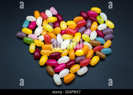 Jelly beans, colorful sweet heart-shaped candies. Stock Photo