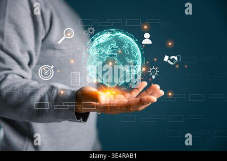 Hand presenting glowing global network sphere with business icons, symbolizing international collaboration, digital transformation, connected workflow Stock Photo