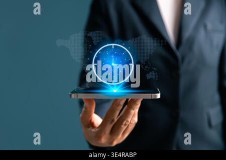 Business professional holding tablet with glowing world clock interface, representing global time management, scheduling, international coordination, Stock Photo