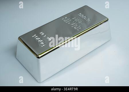 Fine silver bar isolated on a grey background Stock Photo