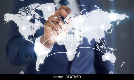 Businessman showing with connections on the word map Stock Photo