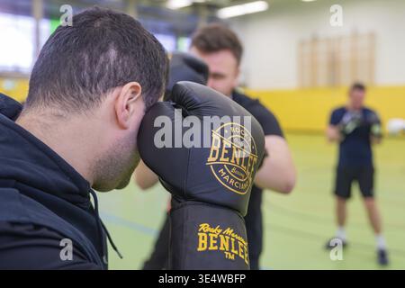 Group training in the sports hall, men with BenLee boxing gloves practicing together, boxing TSV Calw, Germany Stock Photo