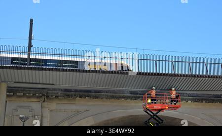 SYDNEY -  JAN 07 2026:Construction workers are repairing a train bridge in Sydney, ensuring safe rail transport and infrastructure reliability across Stock Photo