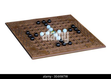 Nine Men Morris is a strategy board game for two players. Players aim to form mills-three of their pieces in a row isolated on white background. Stock Photo