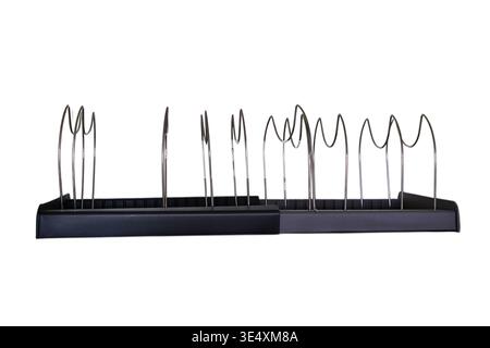 Adjustable kitchen rack for pan or lid storage on white background. Organizer for cupboard organization. Metal drying rack with plastic base. Gadget f Stock Photo