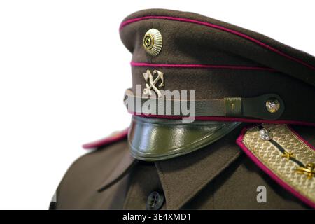 Rail worker uniform cap with insignia isolated on white background. Professional railway conductor clothing detail. Official transport logistics perso Stock Photo