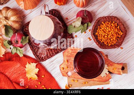 Autumn Flatlay with Herbal Tea, Teapot and Leaves Stock Photo