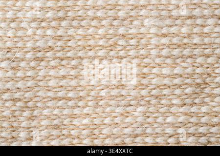 Light alpaca wool knitted textile macro natural fabric texture background Stock Photo