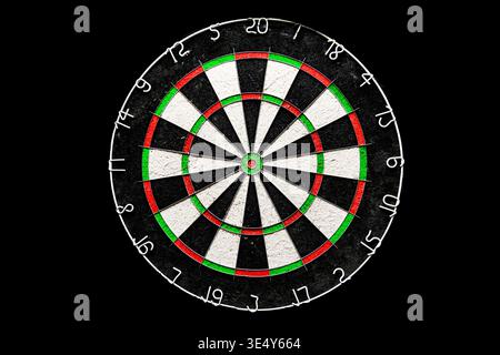 Professional dartboard with sisal texture isolated on black background Stock Photo