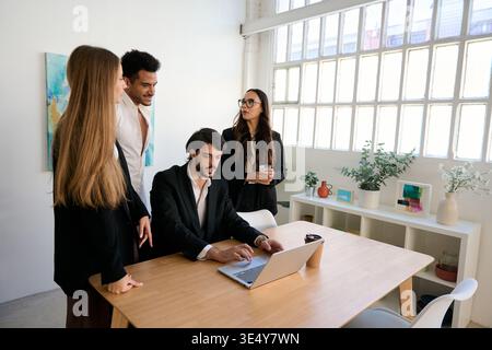 Business team collaborating on a modern office project Stock Photo