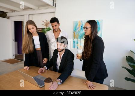 Business team discussing project during office meeting Stock Photo