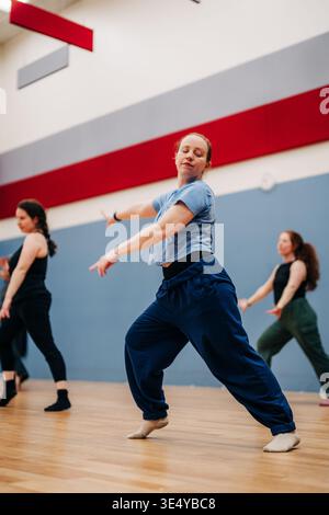 Female dancers practicing contemporary movement in studio class Stock Photo