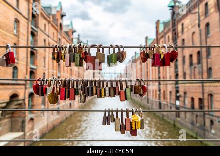 Love locks on a bridge in the Speicherstadt district of Hamburg Stock Photo