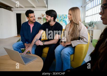 Diverse business team collaborating during office meeting Stock Photo