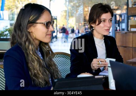 Women collaborating during business meeting at cafe Stock Photo