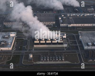 Aerial view of artificial intelligence data center emitting steam from cooling system Stock Photo