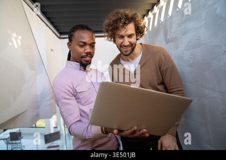 Business people with laptop, innovation in research and programming for future app technology Stock Photo