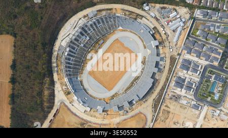 Aerial view of Chaiyaphruek Pattaya Stadium under construction with its oval track and grandstands in Muang Pattaya, Chang Wat Chon Buri, Thailand. Stock Photo