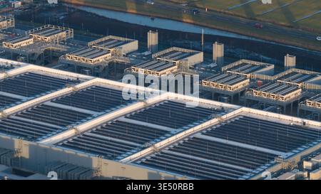 Aerial view of the Datacenter Winschoten featuring extensive cooling systems and solar panels on the roof Winschoten, Netherlands. Stock Photo