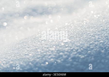 Close-up snow field background. Snow texture. Winter sunny day Stock Photo
