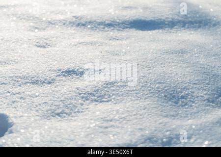 White snow field on a frosty sunny day. Snow background Stock Photo