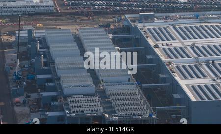 Groningen, Netherlands - 20 January 2026: Aerial view of Datacenter Westpoort with its large industrial buildings, cooling systems, and construction c Stock Photo