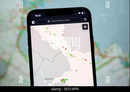 Paris, France - March 30, 2026: Smartphone displaying MarineTraffic live map of the Bab-el-Mandeb Strait, a vital maritime corridor near Djibouti. Stock Photo