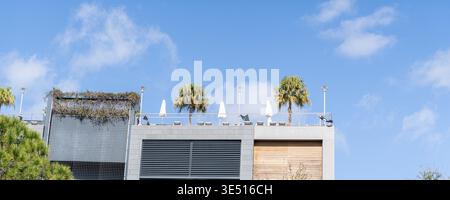 Luxury Rooftop swimming pool on top of hotel Stock Photo