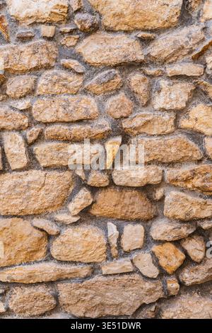 wall made of stones with visible texture Stock Photo