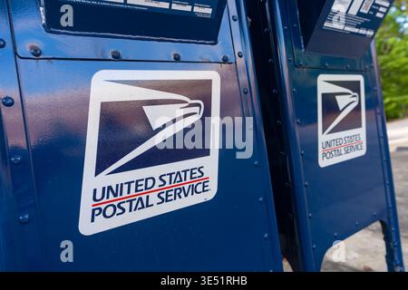 United States Postal Service Logo On Blue Metal Mailboxes Classic Street Side Drop Off Collection Boxes Stock Photo