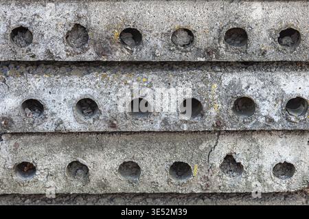 Concrete floor slabs with round voids. Element of residential construction. Building materials in a stack Stock Photo