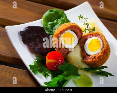 Scotch eggs with vegetables Stock Photo