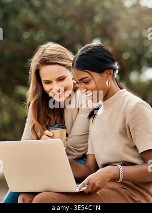 Students, women or reading with laptop on campus, assignment planning or study for university course. Research project, pc or happy friends with test Stock Photo
